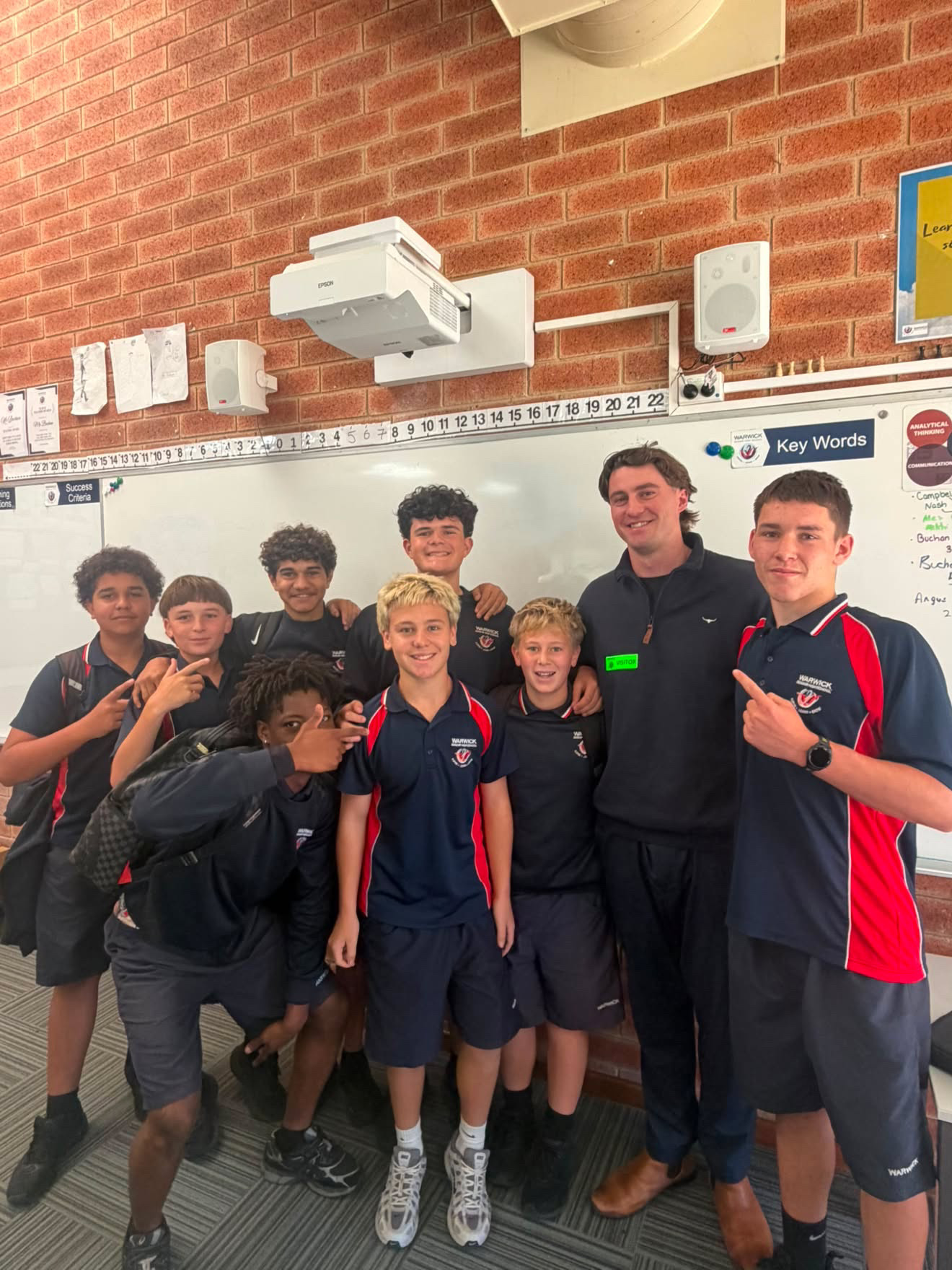 Jacob Blight with a group of students after a school workshop