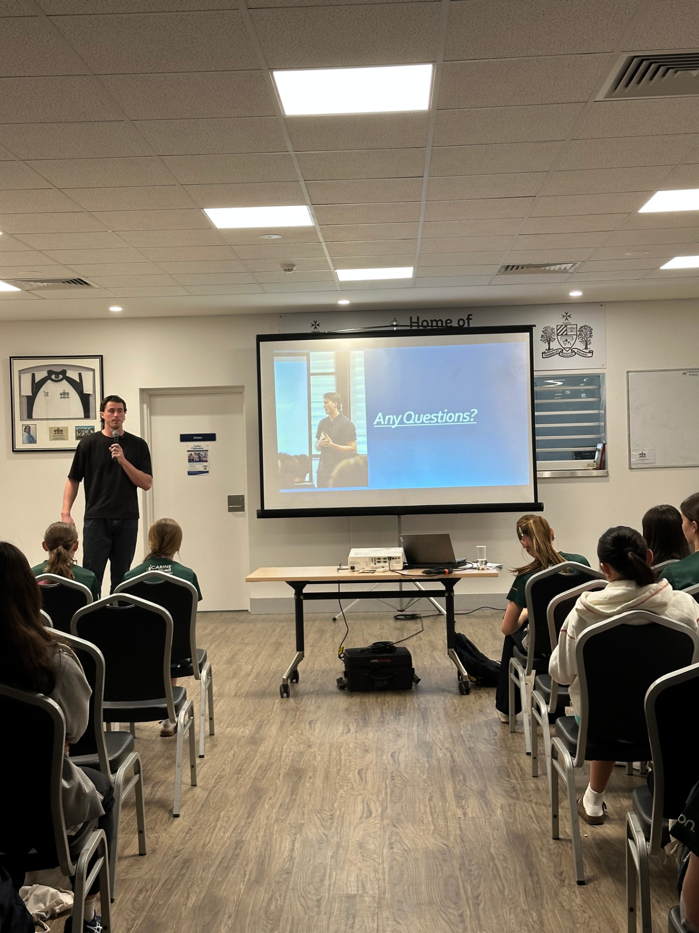 Jacob Blight presenting a development workshop to a sporting club